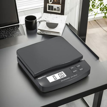 Amazon Basics Digital Postal Shipping Scale with Tare Function, AC Adapter, 65 lb Capacity, 0.1 oz Readability, LCD Display, Black - size: 65 pound